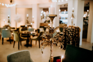 Golden Candle Holder in a Cozy Dining Interior