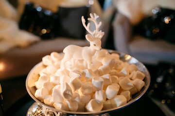 White Reindeer Figurine on Marshmallow Display