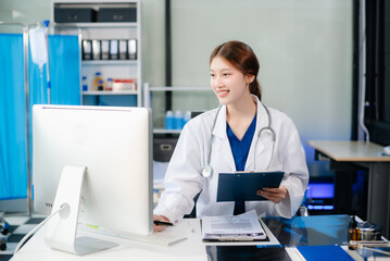 Confident healthcare professional in a hospital setting, analyzing patient data on a laptop