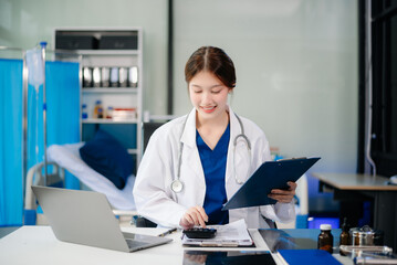 Confident healthcare professional in a hospital setting, analyzing patient data on a laptop