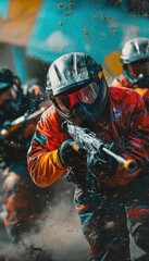Obraz premium Dynamic Paintball Action in Charity Event with Vibrant Gear and Team Spirit