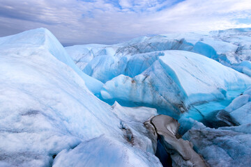 Impressive structure on the Greenlandic ice cap during overnight expedition. Waves out of blue ice.