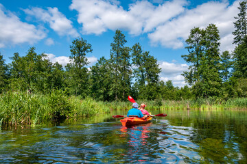 Rafting down the Krutynia river, Warmian-Masurian Voivodeship, Poland	
