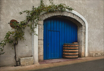 Large blue doorway leading to a winery which is closed