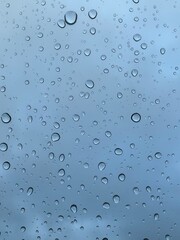 Abstract background with raindrops on glass. High quality photo