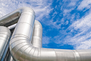 pipeline line close-up against blue sky and clouds