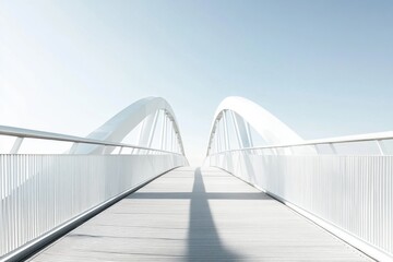 Obraz premium A modern white bridge with a clear sky, emphasizing minimalism and architectural design.