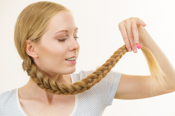 Blonde young woman with braid hair