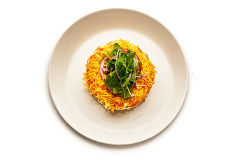 A plate of food with a variety of vegetables and cheese