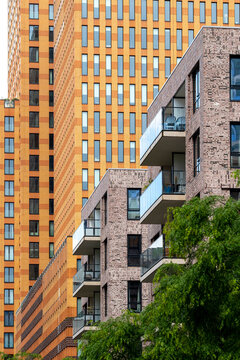 This image highlights modern residential designs featuring balconies adorned with greenery, blending urban living with natural elements for a refreshing ambiance in Amsterdam Zuid