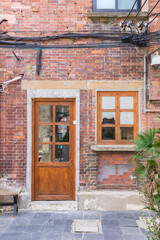 Door and window of a small historic house in Tianzifang, Shanghai, China
