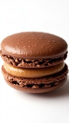 A vibrant Belgian macaroon stands out against a minimalist white background