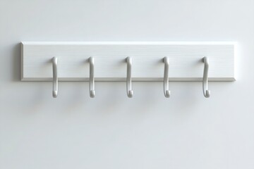 A white wooden coat rack with five wall hooks in matte silver, hanging on a solid color background