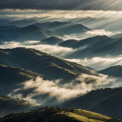 A misty mountain range, with rolling clouds and rays of sunlight breaking through.