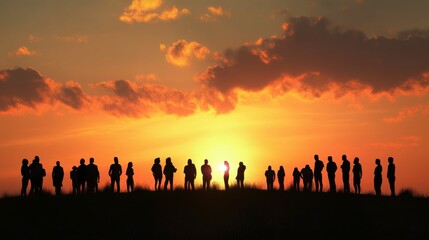 Fototapeta premium Silhouette of people standing together at sunset, creating a peaceful scene