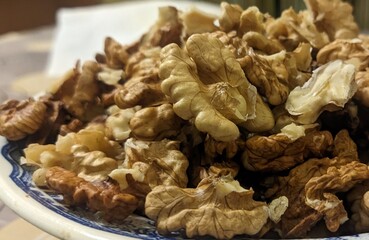 The walnut kernels are ready to lie on a plate. Cleaned. Without scorpupa