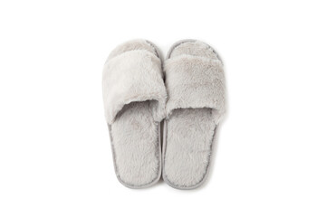 Soft slippers isolated on white background. Home slippers. Comfortable shoes for home. Foot care concept. Home comfort. Space for text. Copy space.