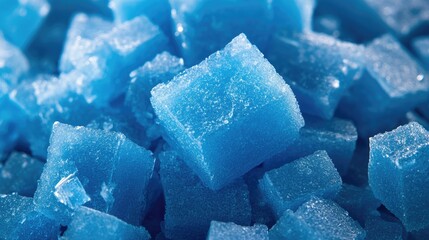Close-up of bright blue aerogel particles highlighting their lightweight texture and exceptional strength for versatile applications in various industries