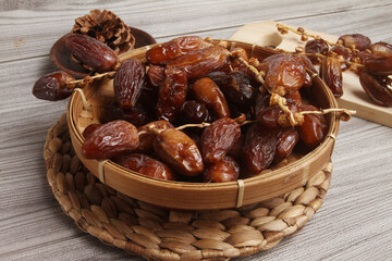 dates in a wooden bowl