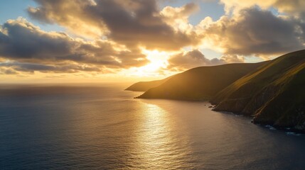 Fototapeta premium Aerial Coastal View with Sunlight Reflecting on Ocean
