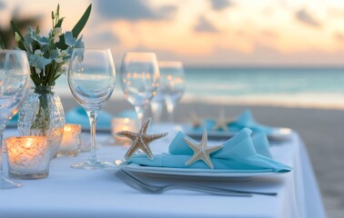 Elegant beachside dining setup with blue accents during sunset near the ocean