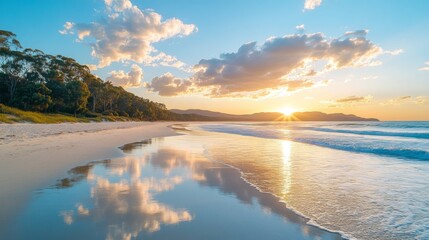 Fototapeta premium Tranquil Sunset Over a Coastal Beach with Rolling Waves and Reflections