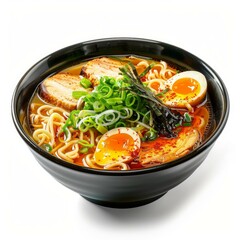 Ramen in black bowl with chashu pork, marinated egg, nori seaweed, spring onion and spices
