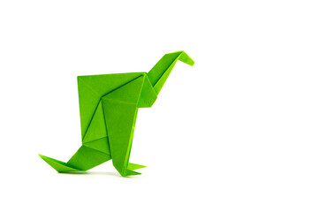 Paper spinosaurus on a white background. Origami Dinosaur. Paper crafts. paper art.