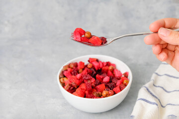 Vinaigrette beetroot alad on neutral background