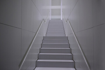 Minimalist staircase leading up, abstract concept