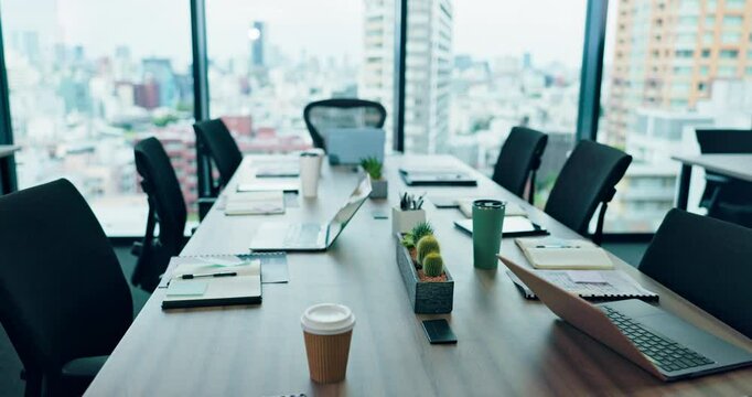 Boardroom, business and window of office in city for company development, growth or meeting. Corporate, table and chairs with view of Tokyo, Japan from empty professional urban workplace for strategy