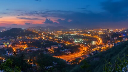 A panoramic view of a modern city glowing with lights during the evening rush hour, showcasing urban energy. 