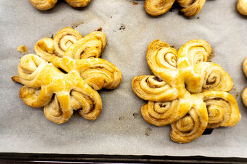 Puff pastry flowers with cinnamon sugar.Puff pastry. Dessert. Cinnamon. Sugar. Food concept