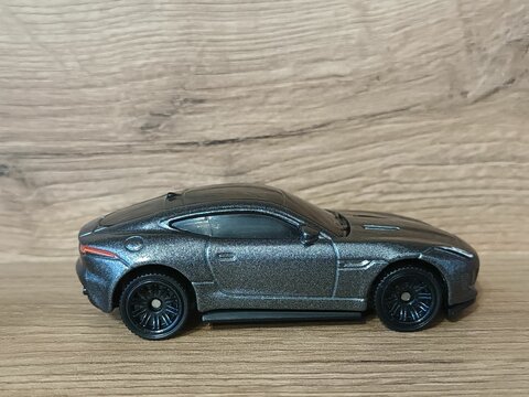 Close-up shot of a Matchbox toy model Jaguar car on a white background