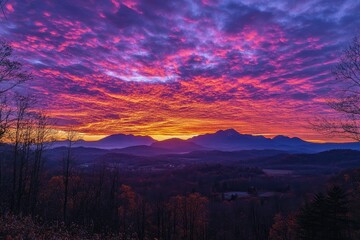Fototapeta premium Majestic sunrise illuminating mountains and valley with vibrant colors