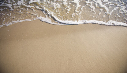 Sand and sea wave. Beach copy space nature background