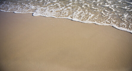 Sand and sea wave. Beach copy space nature background