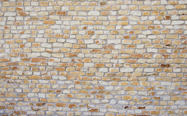 natural Old yellow brick wall, shade of yellow stone