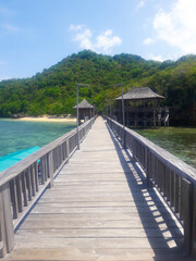 wooden bridge over the sea