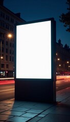 Illuminated Blank Billboard Displaying Urban Nightlife in a City Environment