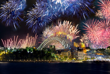 Sydney Harbour Bridge New Years Eve fireworks, colourful NYE fire works lighting the night skies...