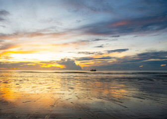 Naklejka premium sunset on the beach