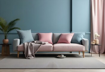 A modern living room with a large gray sofa with pink and teal throw pillows, a gray blanket, and a teal wall in the background