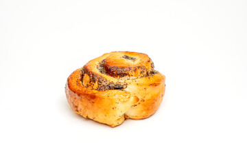 A cinnamon roll sits on a white background. The roll is brown and has a hole in the middle