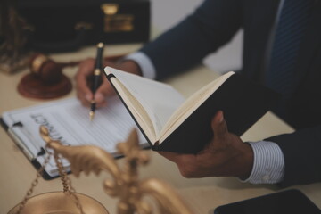 Law theme, gavel or mallet of the judge, lawyer enforcement officers, evidence-based cases taken into account in the court abount business, legislation.