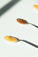 spoon of peanut butter paste cream nut cream nut butter