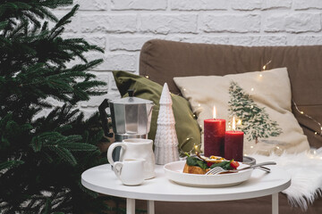 A Cozy Holiday Breakfast Scene Complete with Soft Candles and Beautiful Christmas Decor