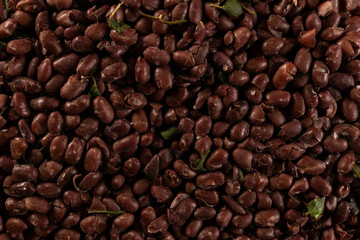Cooked Black Beans on a plate Pattern texture background