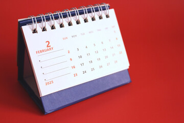 Monthly calendar template for the new year 2025 desk calendar,on red background