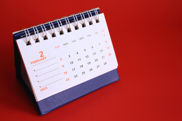 Monthly calendar template for the new year 2025 desk calendar,on red background